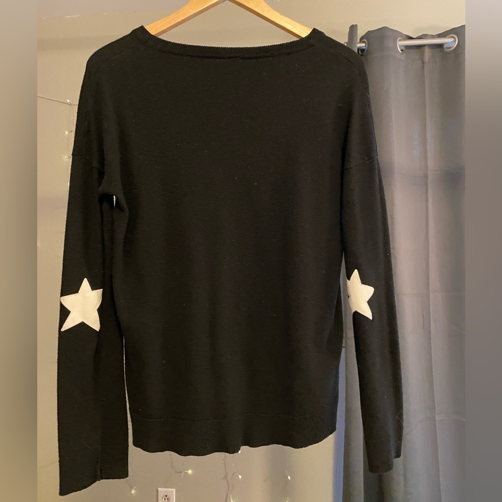 Black sweater with star elbow patches